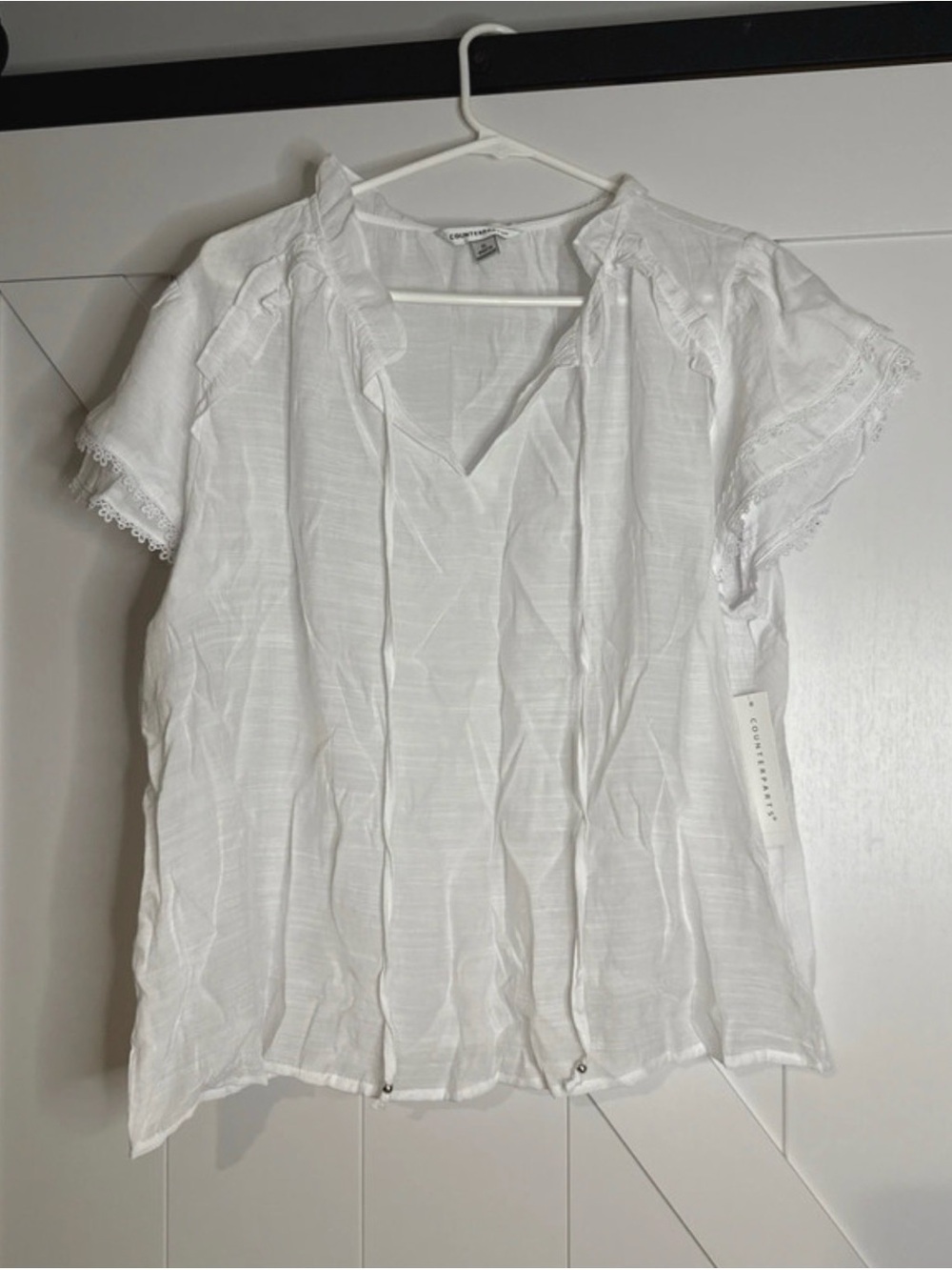 Short-Sleeve White Peasant Blouse with Tie Neck
